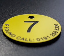plastic numbers, laminate numbers, plastic discs, plastic numbered discs, numbered discs, table numbers, door numbers, keyrings,