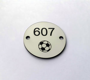 stadium seat numbers - plastic seat indicators - plastic numbered discs for stadium seats - laminate seat numbers